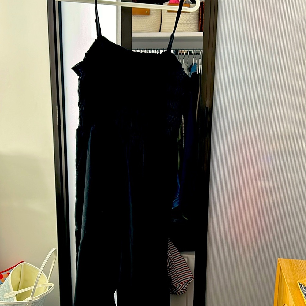 A classic black jumpsuit